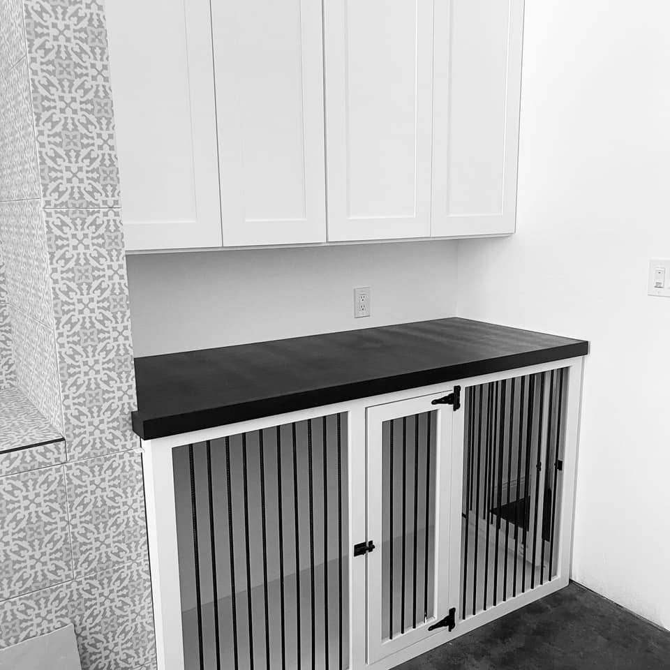white dog kennel in a kitchen